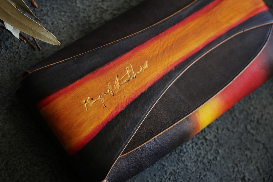 サンバースト革財布