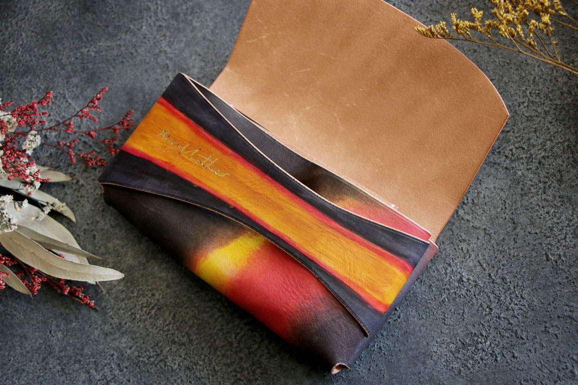 サンバースト革財布