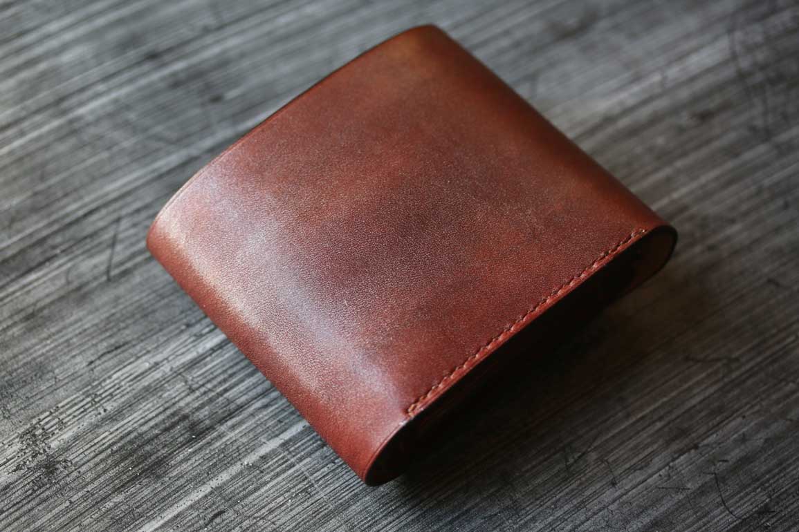 銅染色革フラップ折財布
